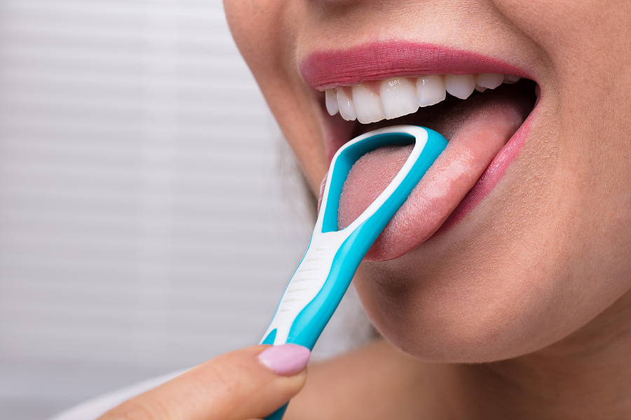 5 Ways To Clean Your Toothbrush & Tongue Scraper