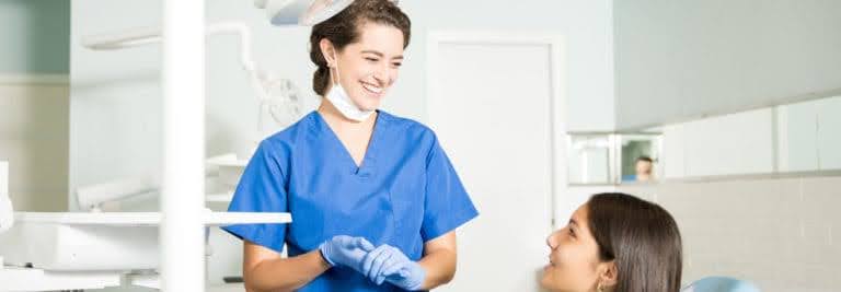 A Friendly Appointment of a Holistic Dentist and Her Patient Before a Functional Dentistry Procedure A Friendly Appointment of a Holistic Dentist and Her Patient Before a Functional Dentistry Procedure