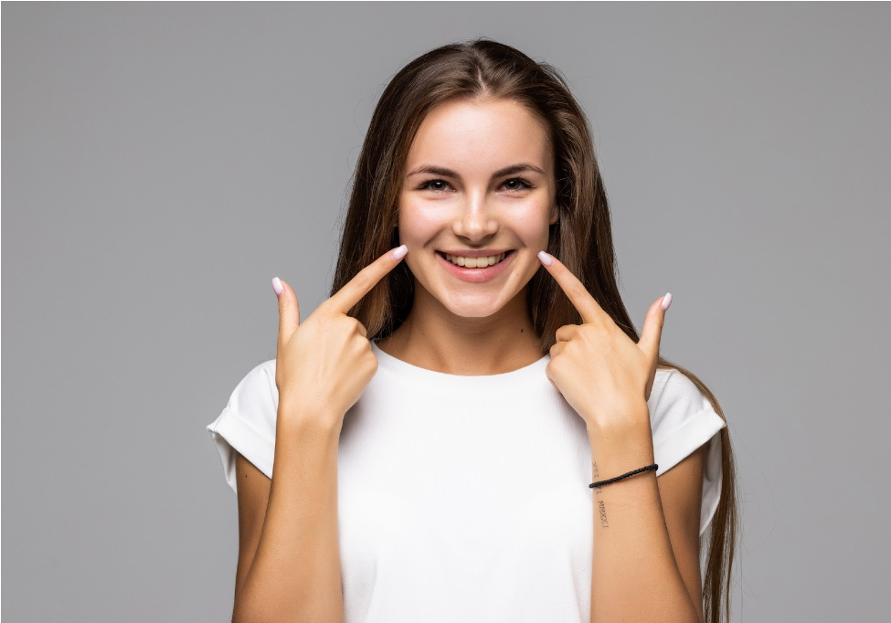 Satisfied dental patient showing her beautiful smile